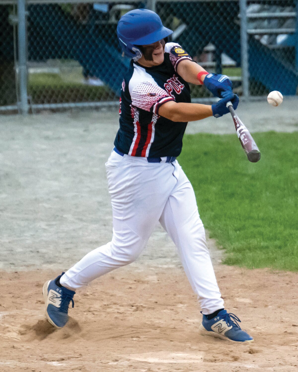 Zach Fontenault makes contact at the plate. Fontenault drove in three runs in the seoncd game.